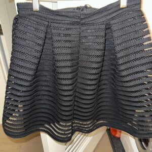 Black very unique mini skirt